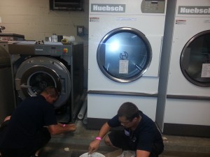 Josh and Jake install the Tennessee Titans' new OPL laundry system.