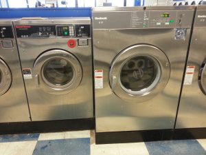 Here is a picture of a Huebsch 60# coin laundry machine sitting next to the Speed Queen 30#. Note the attractiveness and clean lines of the machine controls. Much more thought put into the actual customer experience on the Huebsch side.