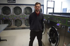 Owner JD Dixon proudly displays some fantastic Huebsch commercial laundry equipment at his store in Dickson, TN.